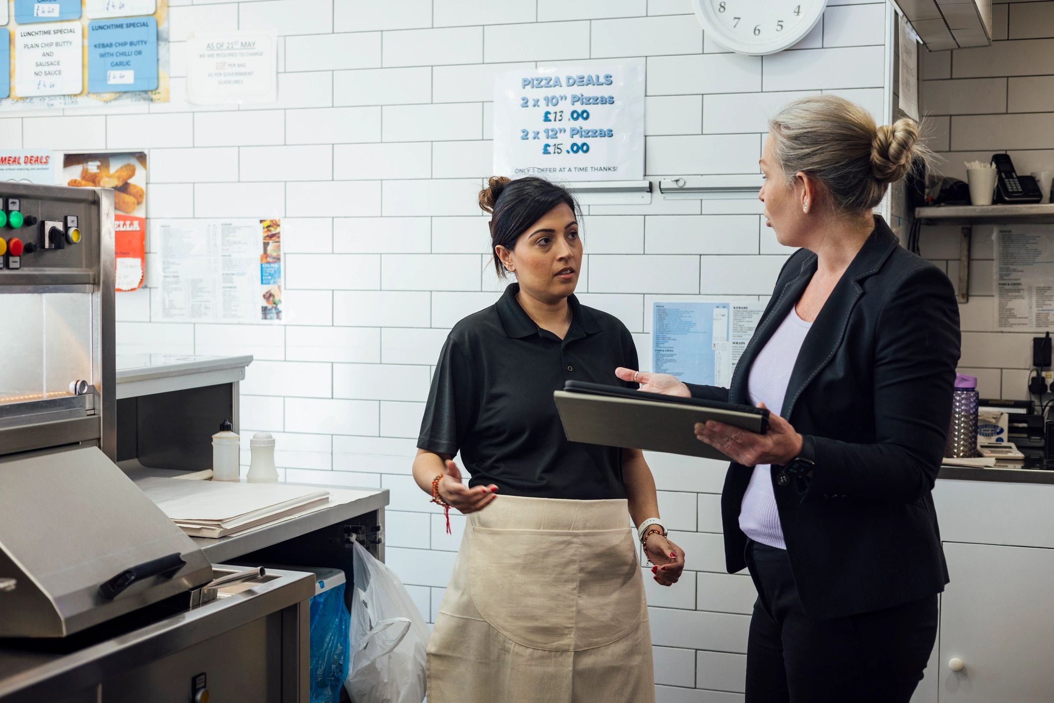 Advisor meeting with a small business owner